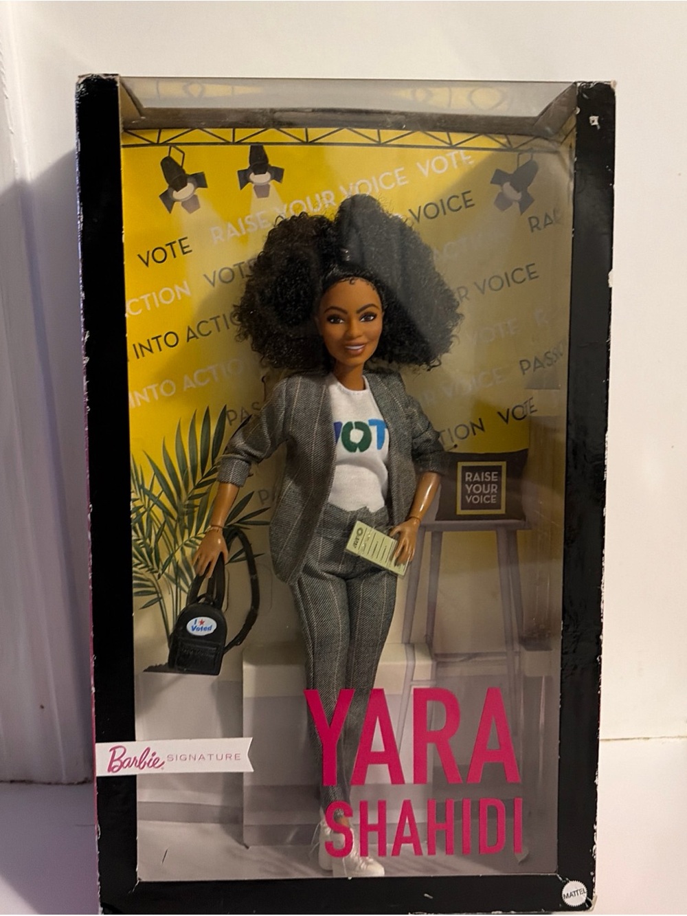 Barbie Yara Shahidi Doll - Gray Suit with White Tee and Teal/Blue Vote Print